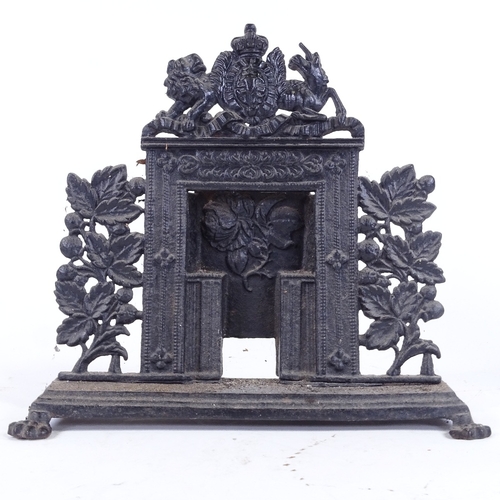 369 - A group of Victorian cast-iron and brass fireplace design doorstops, largest height 30cm (4)