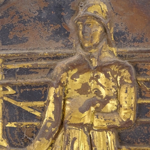 373 - A 19th century embossed brass Birmingham fire mark, depicting a fireman and engine, height 26cm