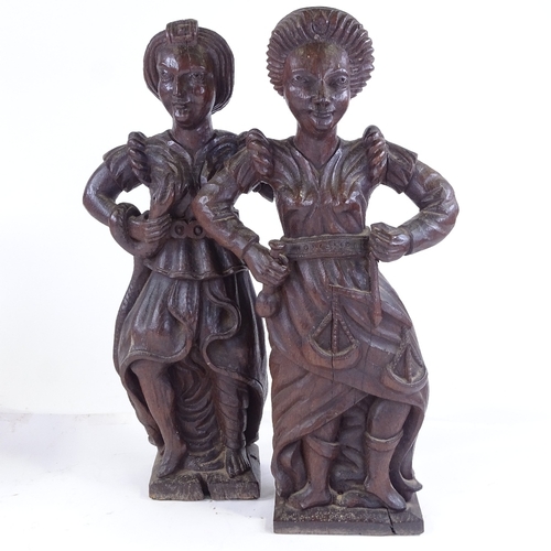 374 - A pair of 18th century carved oak Classical figures, height 50cm