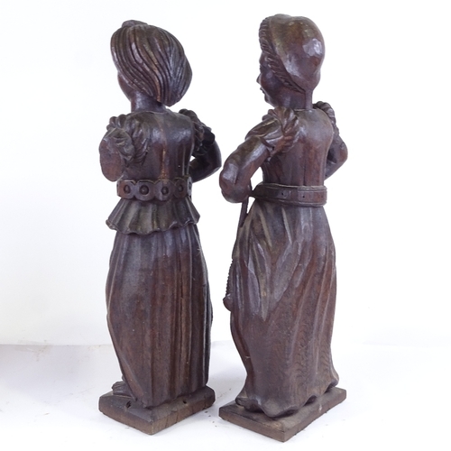 374 - A pair of 18th century carved oak Classical figures, height 50cm