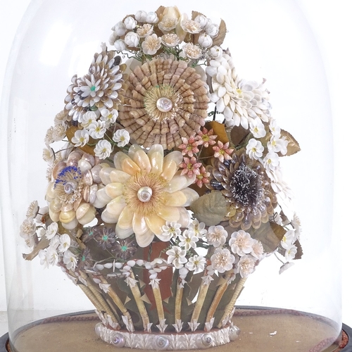 375 - A 19th century floral shell display under glass dome, overall height 42cm