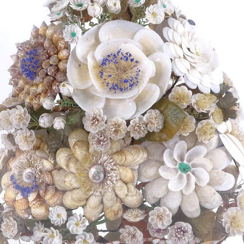 375 - A 19th century floral shell display under glass dome, overall height 42cm