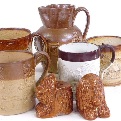 376 - A group of 19th century salt glazed stoneware, mugs, jug and lion design furniture mounts (7)