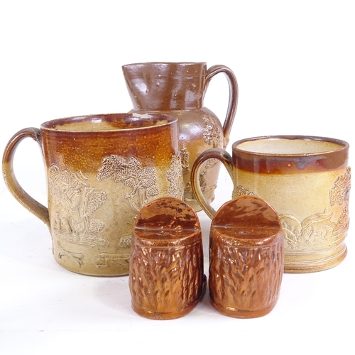 376 - A group of 19th century salt glazed stoneware, mugs, jug and lion design furniture mounts (7)