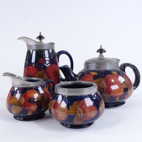 420 - MOORCROFT POTTERY - pomegranate pattern 4-piece tea set with hammered pewter mounts