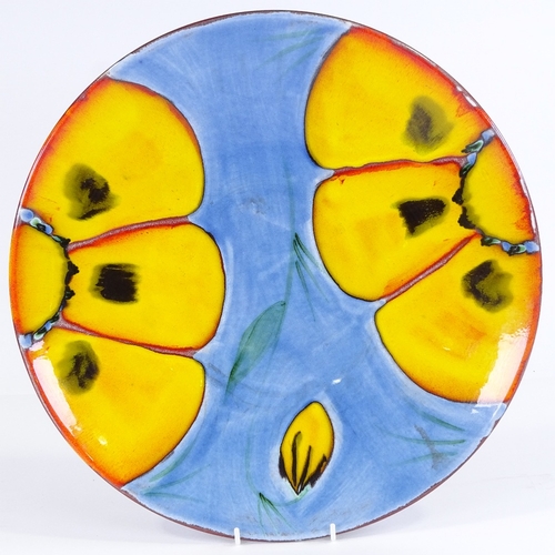 422 - A large Poole Pottery charger, 39.5cm diameter