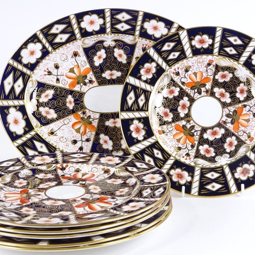 427 - A set of 6 Royal Crown Derby Imari pattern plates, diameter 27cm, and a matching meat plate, diamete... 