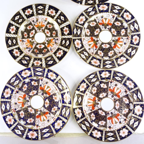 427 - A set of 6 Royal Crown Derby Imari pattern plates, diameter 27cm, and a matching meat plate, diamete... 