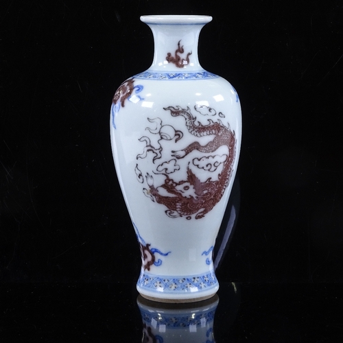 430 - A small Chinese porcelain vase with painted dragon design, height 14.5cm