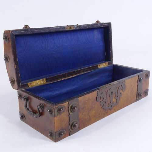 441 - A Victorian burr-walnut dome-top box with engraved brass strapwork mounts, brass bosses and drop han... 