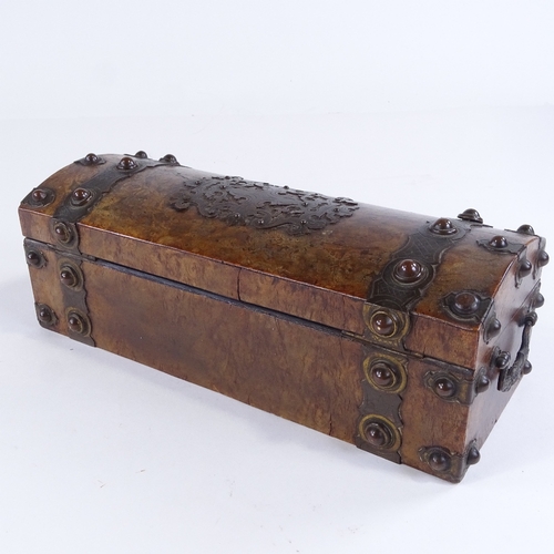 441 - A Victorian burr-walnut dome-top box with engraved brass strapwork mounts, brass bosses and drop han... 