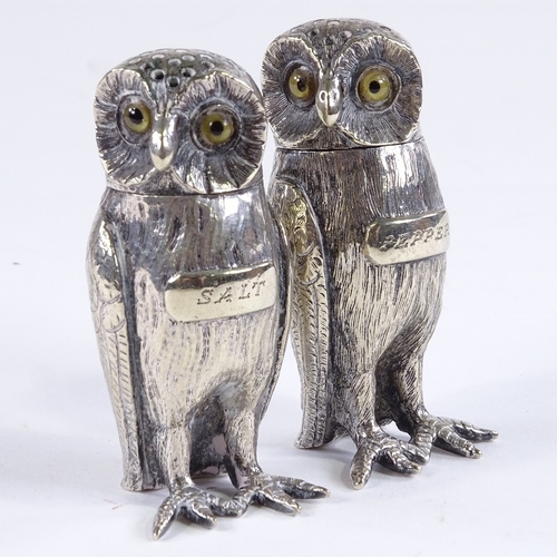 442 - A pair of Victorian electroplate owl design salt and pepper pots, height 7.5cm