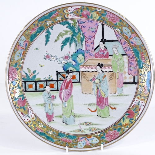 445 - A Chinese porcelain plate with painted enamel figures, diameter 31cm