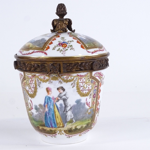 446 - A late 19th century German porcelain urn and cover, with painted and gilded decoration, and gilt-bro... 