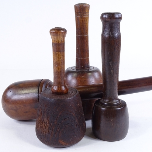 455 - A 19th century lignum vitae wood carving mallet, length 35cm, and 3 other 19th century mallets (4)