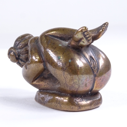 480 - A Japanese erotic bronze crouching figure, length 5.5cm