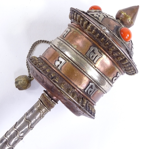 490 - A Tibetan mixed metal prayer wheel