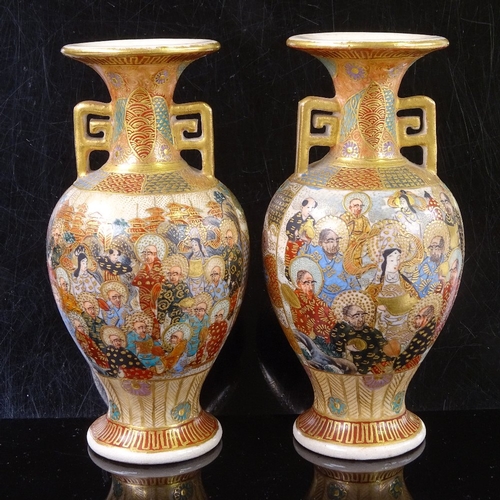 501 - A pair of Japanese Satsuma porcelain vases, with painted and gilded decoration, signed under base, h... 