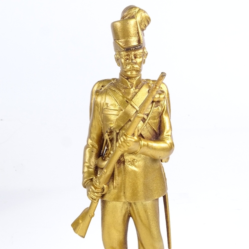 504 - A 19th century gilt-bronze figure of a Prussian soldier, height 19cm