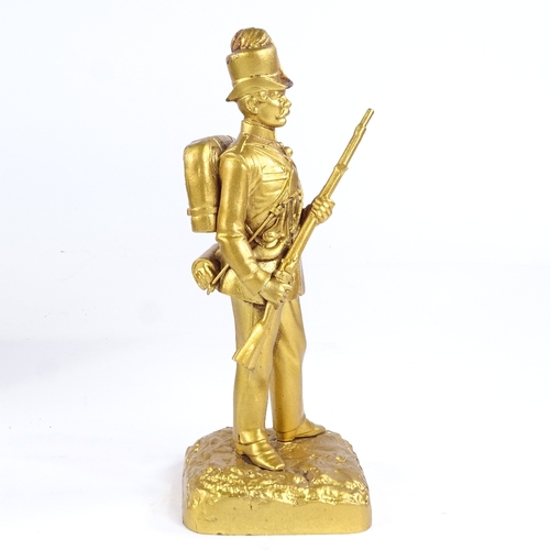 504 - A 19th century gilt-bronze figure of a Prussian soldier, height 19cm