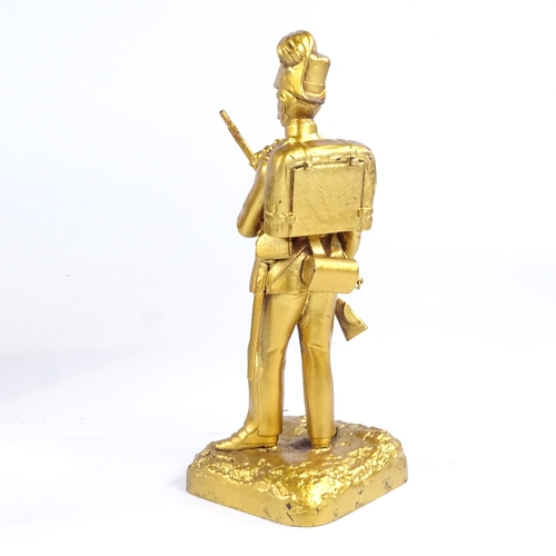 504 - A 19th century gilt-bronze figure of a Prussian soldier, height 19cm