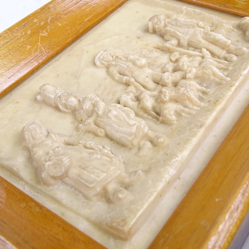 506 - A pair of simulated ivory relief plaques, framed, overall dimensions 12cm x 9.5cm