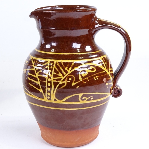 508 - A slip glaze stoneware pottery jug, height 21cm