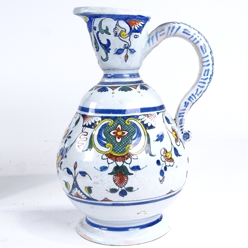 509 - A Dutch Delft tin-glazed pottery ewer, height 26cm