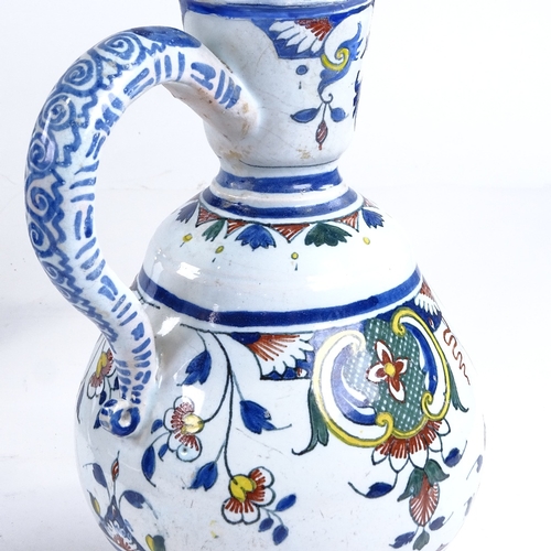 509 - A Dutch Delft tin-glazed pottery ewer, height 26cm