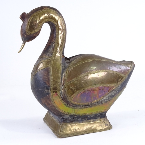 512 - A Persian brass-mounted carved wood duck, height 25cm