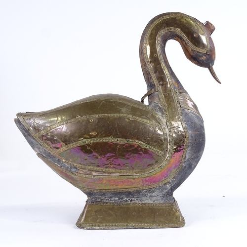 512 - A Persian brass-mounted carved wood duck, height 25cm