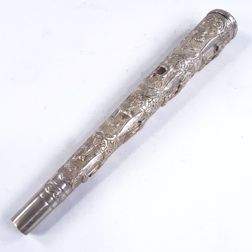 525 - An Indian relief embossed silver parasol/walking stick handle, length 23cm