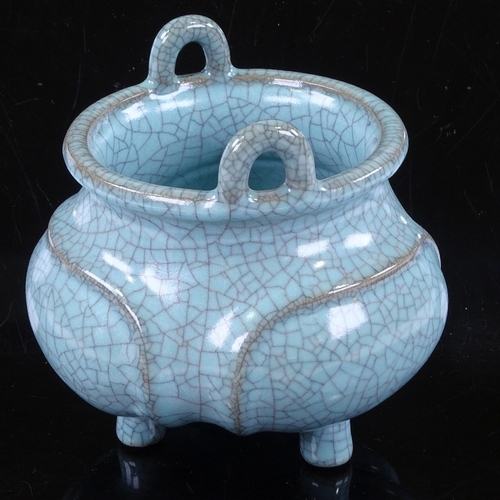 529 - A Chinese pale blue crackle glaze porcelain censer with ring handles, rim diameter 10cm, height to r... 