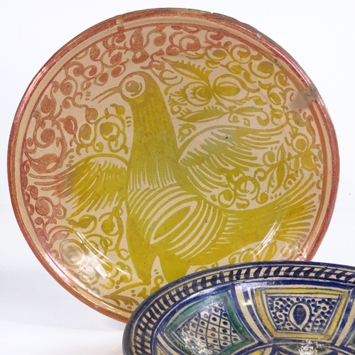 540 - A Spanish lustre glaze pottery bowl, with painted bird decoration, diameter 33cm, and another painte... 