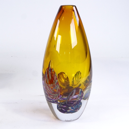 550 - LOUIS THOMPSON (LONDON GLASSBLOWING) - amber blue and red glass vase, height 23cm