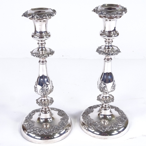 560 - A pair of 19th century electroplate candlesticks, height 27cm