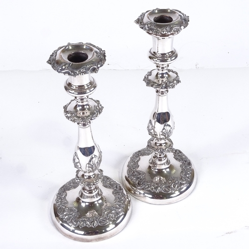 560 - A pair of 19th century electroplate candlesticks, height 27cm