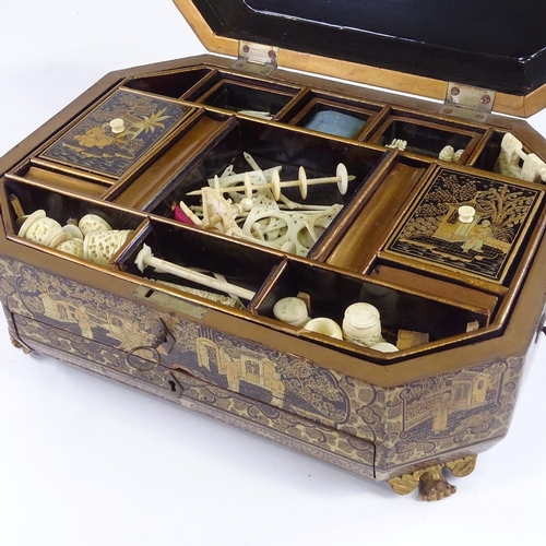 566 - A 19th century chinoiserie gilded and lacquered sewing box, on carved giltwood feet, interior fitted... 