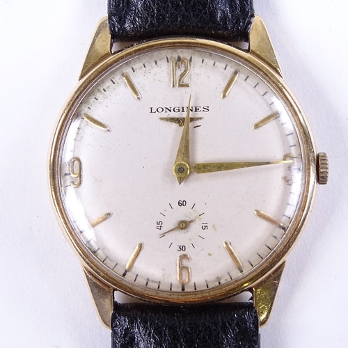 1014 - LONGINES - a Vintage 9ct gold mechanical wristwatch, silvered dial with gilt quarterly Arabic numera... 