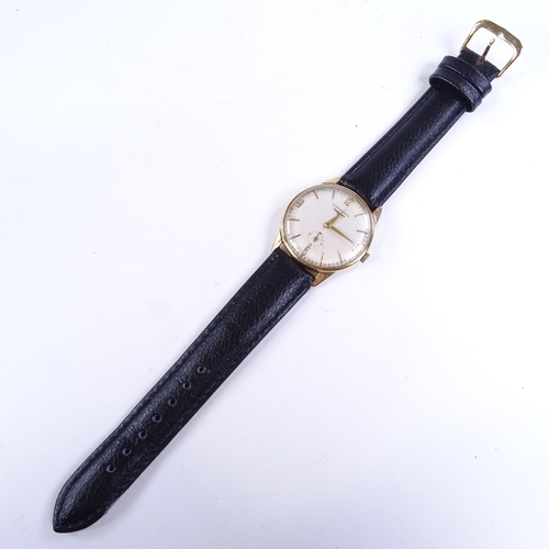 1014 - LONGINES - a Vintage 9ct gold mechanical wristwatch, silvered dial with gilt quarterly Arabic numera... 