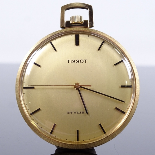 1020 - TISSOT - a Vintage gold plated Stylist open-face top-wind pocket watch, gilt dial with black baton h... 