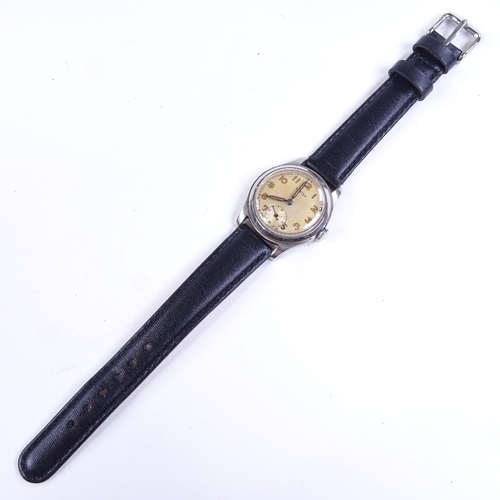 1021 - VERTEX - a Vintage military style stainless steel mechanical wristwatch, ref. 12323, silvered dial w... 