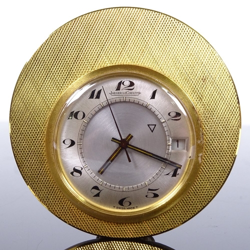 1024 - JAEGER LECOULTRE - a Vintage gold plated travelling alarm clock timepiece, silvered dial with painte... 