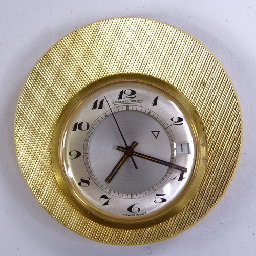 1024 - JAEGER LECOULTRE - a Vintage gold plated travelling alarm clock timepiece, silvered dial with painte... 