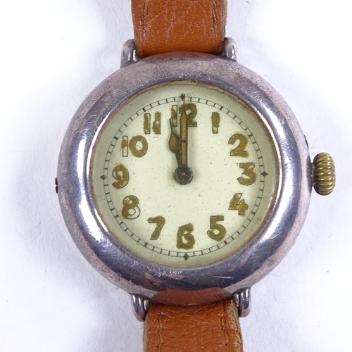 1030 - A First War Period silver-cased Officer's trench mechanical wristwatch, white enamel dial with Arabi... 