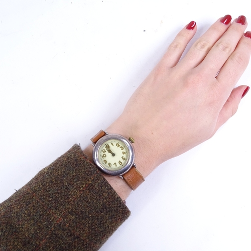 1030 - A First War Period silver-cased Officer's trench mechanical wristwatch, white enamel dial with Arabi... 