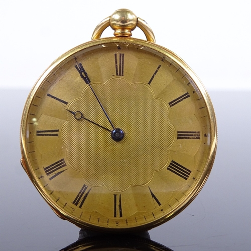 1035 - An early 19th century 18ct gold open-face key-wind slimline pocket watch, engine turned dial with Ro... 