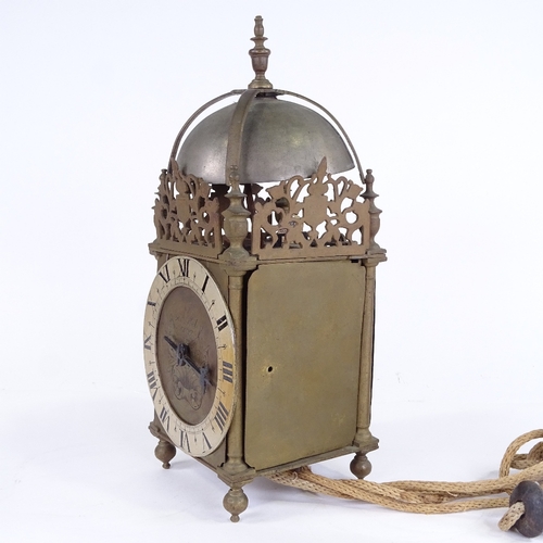 1058 - A late 19th/early 20th century brass-cased lantern clock, dial inscribed James Pool, silvered chapte... 