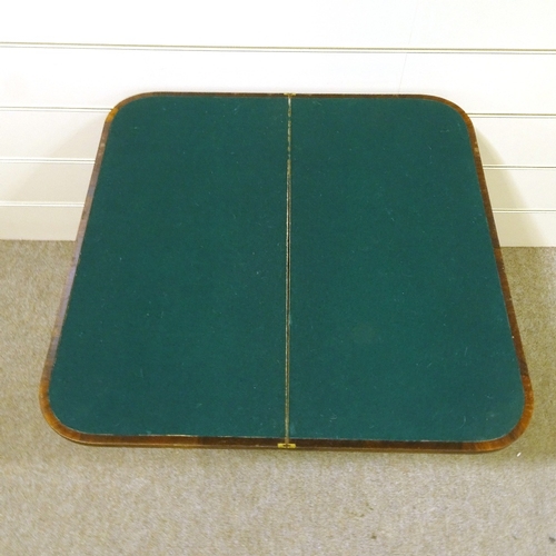 346 - A 19th century rosewood fold over card table, on platform base