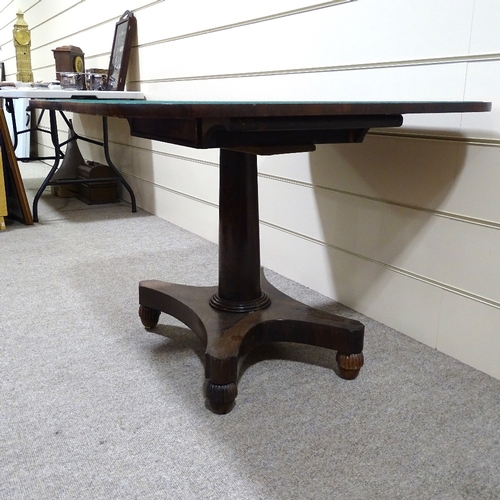 346 - A 19th century rosewood fold over card table, on platform base